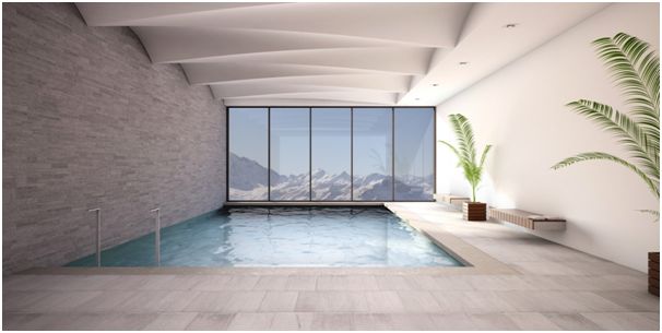Bazén s kontrolovaným větráním. Desky Knauf Drystar-Board umožňují vytvoření moderního prostoru včetně zajímavých designových konstrukcí zavěšených podhledů a předsazených stěn. (Zdroj: Knauf)