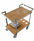 Servírovací stolek Trolley (design stolku Frederic Ruyant) s ocelovým  rámem a odkládacími policemi z přírodního dubu, 75 x 45 x 80 cm, cena zatím nebyla stanovena, LIGNE ROSET
