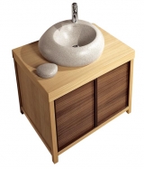 Keramické umyvadlo z kolekce Pure Stone (VILLEROY &amp; BOCH) se speciální glazurou grey stone v šedavé barvě má rozměry 60 x 62,5 cm. Cena (bez DPH) cca 20 550 Kč, v bílé barvě 19 045 Kč, KREINER EXKLUSIV