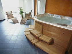 Na domácí fitness navazuje relaxační prostor se saunou a whirlpoolem