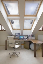 Střešní okna firmy Velux podkrovní byt skvěle prosvětlují