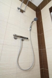 Sprchový kout je vybaven i termostatickou sprchovou baterií značky GROHE