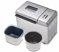 Domácí pekárna OW 400131 s párem nádob pro hranatý i kulatý chléb do 1,2 kg a 13 pečicími programy. Cena 2 990 Kč (TEFAL)