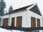 Návrh architektů: tmavá střešní krytina kontrastuje se zářivě bílou fasádou