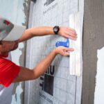 Lepení membrány Baumacol AquaSafe pomocí flexibilního lepidla Baumacol FlexTop Speed